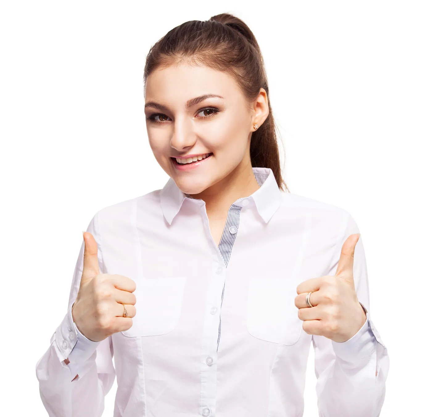 Smiling young woman in a white shirt giving two thumbs up